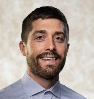 Portrait photo of Scott Lafontaine in white background