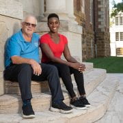 RECOGNITION — University Professor Douglas Rhoads with Tameka Bailey, assistant professor of biological sciences. Rhoads has been named a Fellow of the American Association for the Advancement of Science. (Photo courtesy of University Relations)