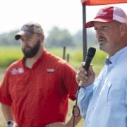 SEED TREATMENT — Weed scientists Jason Norsworthy, right, and Tommy Butts give a presentation on herbicide resistance during the Rice Field Day at the Rice Research and Extension Center in Stuttgart, Aug. 3, 2023.