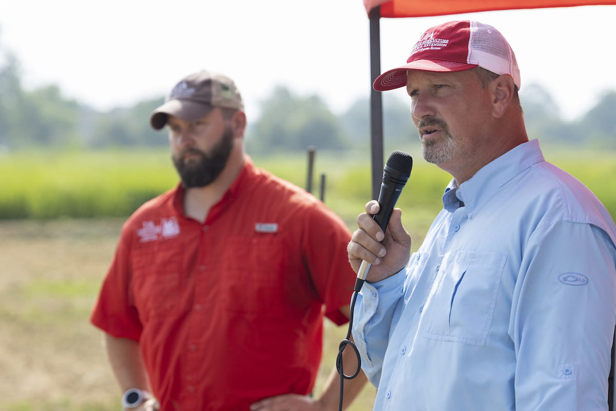SEED TREATMENT — Weed scientists Jason Norsworthy, right, and Tommy Butts give a presentation on herbicide resistance during the Rice Field Day at the Rice Research and Extension Center in Stuttgart, Aug. 3, 2023.