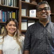 NEW OPPORTUNITIES — Evelyn Madrigal, left, stands with her adviser Rupesh Kariyat, associate professor of crop entomology for the Arkansas Agricultural Experiment Station.