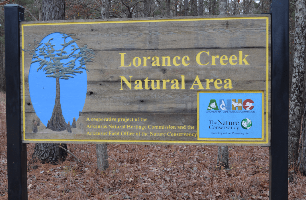 Wooden sign that reads Lorance Creek Natural Area