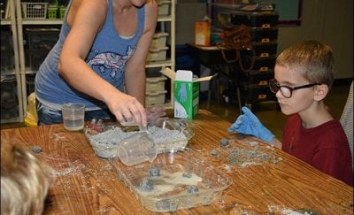 Campers create and dissolve "Moon Rocks"