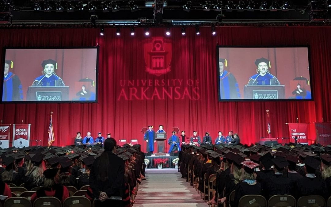 Speeches begin the fall 2022 commencement ceremonies Dec. 17 in Bud Walton Arena of the University of Arkansas.