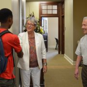 Student is warmly greeted by Assistant Dean Maribeth Lynes