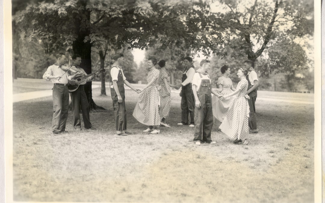 Students play folk music on the Old Main Lawn, University of Arkansas