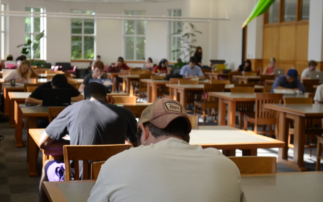 Photo of Studying in the Walton Reading Room