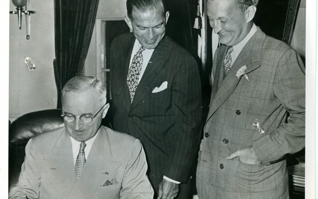 Truman signing Fulbright Act