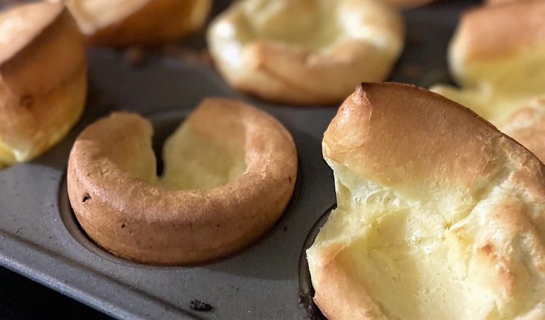 Close-up of yorkshire pudding fresh out of the oven.